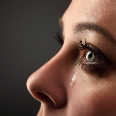 woman crying - process of forgiveness